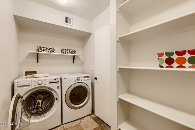 Laundry and huge pantry - 4704 E Paradise Village Pky N