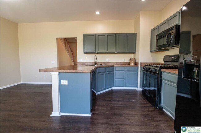 Building Photo - 8475 Putnam Ct