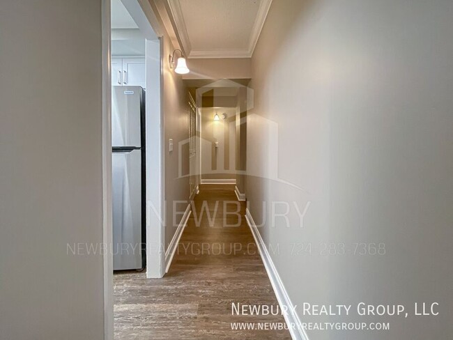 Building Photo - Luxury 1-Bedroom Penthouse with Modern Ren...