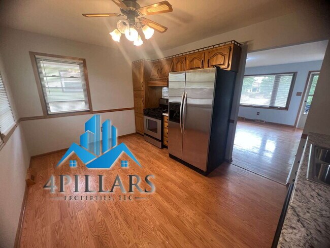 Building Photo - "Charming 3-Bedroom Haven with Finished Basement & Gleaming Hardwood Floors in Hammond!"