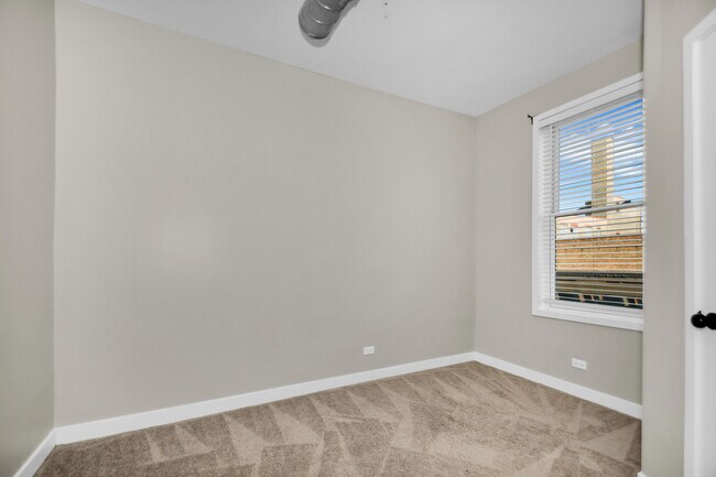 Building Photo - 1820 W Belle Plaine Ave