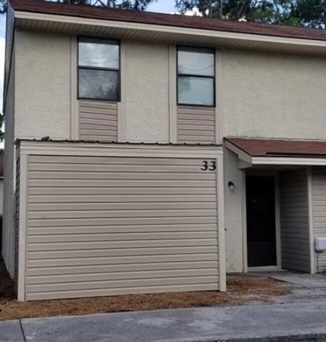 Building Photo - Cozy 3-Bedroom Townhome Close to Base and Shopping