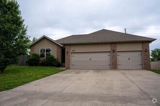 Building Photo - 3 bed home with NEW FLOORING AND FULLY FEN...