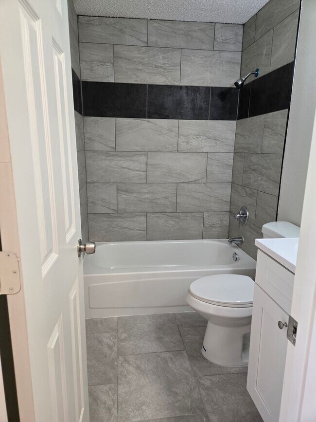 Building Photo - 1300-1306 Melody Ln