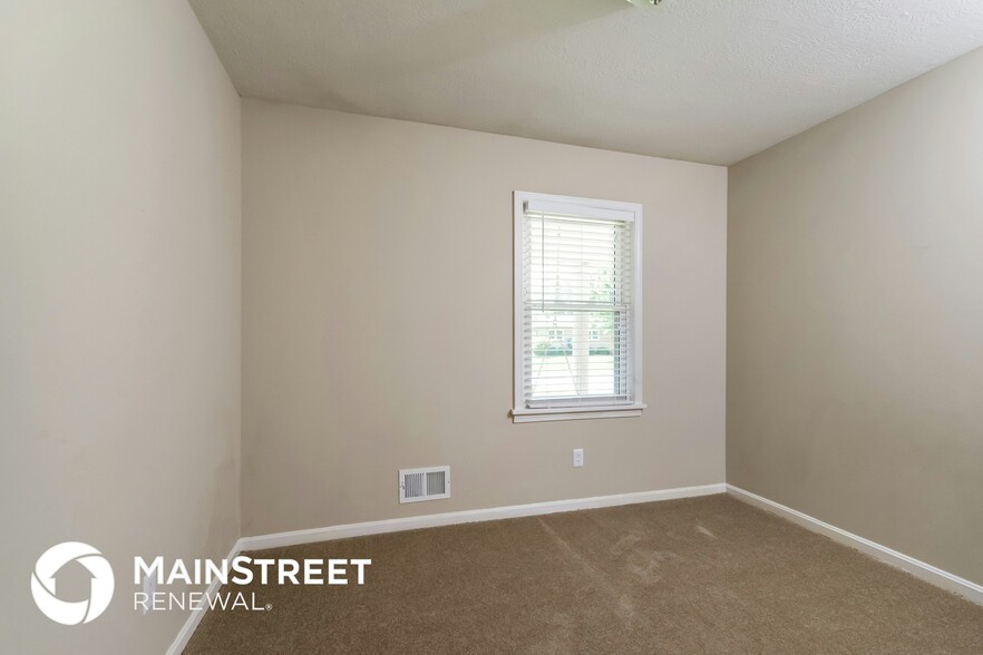Building Photo - 8003 Canna Dr