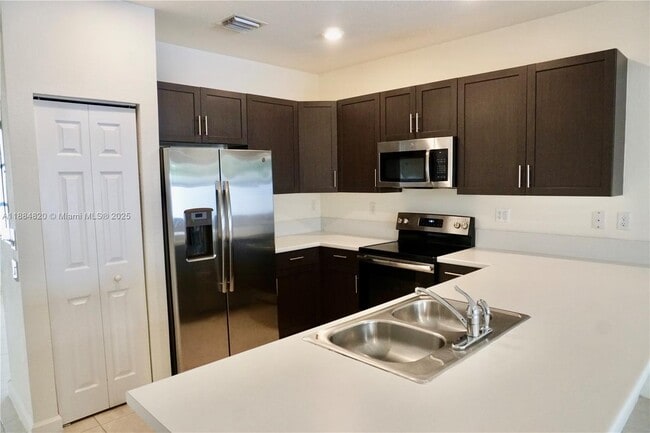 Building Photo - 10606 West 33rd Ct