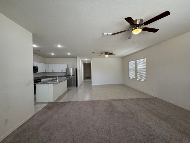 Building Photo - LIKE NEW HOME IN TORTOSA IN MARICOPA