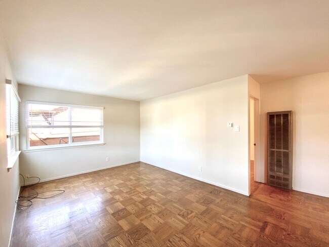 Building Photo - REMODELED KITCHEN! Storage, Parking Available, On-Site Laundry!