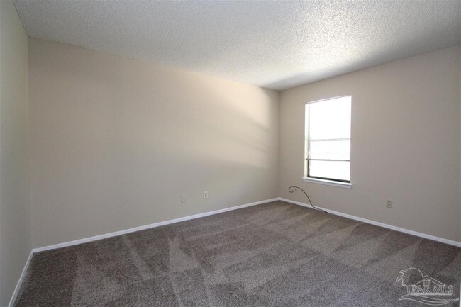 Building Photo - 6801 Tiki Ln