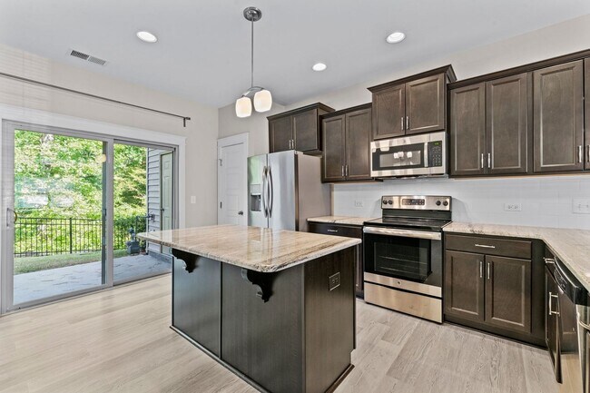 Building Photo - Gorgeous Townhome in N. Raleigh, Top Amenities & Finishes, Community Pool, Pet Friendly!
