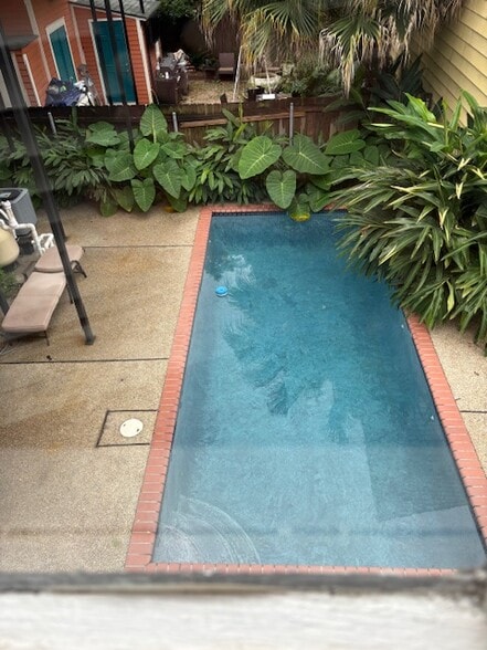 View of pool from bedroom - 1452 Saint Mary St