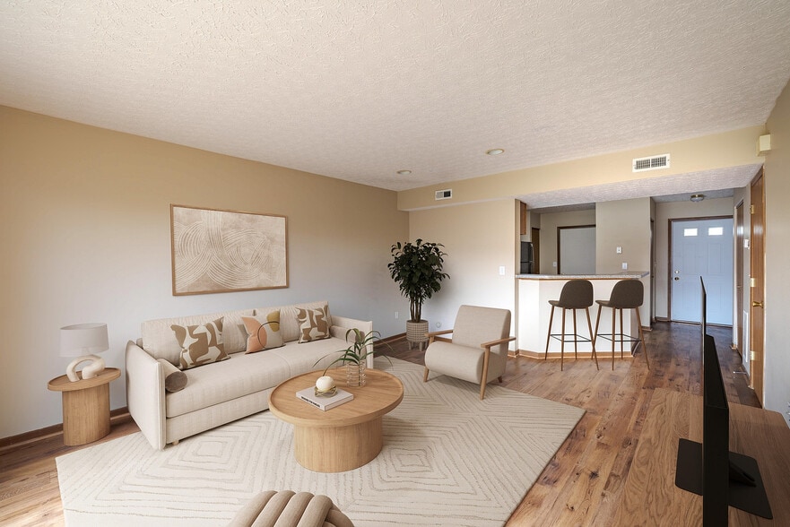 HilliardPark_2026_LivingRoom_VirtuallyStaged - Hilliard Park Apartments