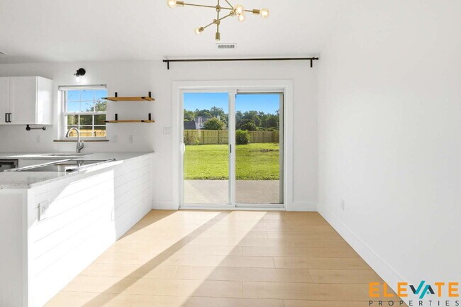 Building Photo - Beautiful Like-New 3 Bedroom Home with Huge Fenced Yard, Greenhouse & Storage