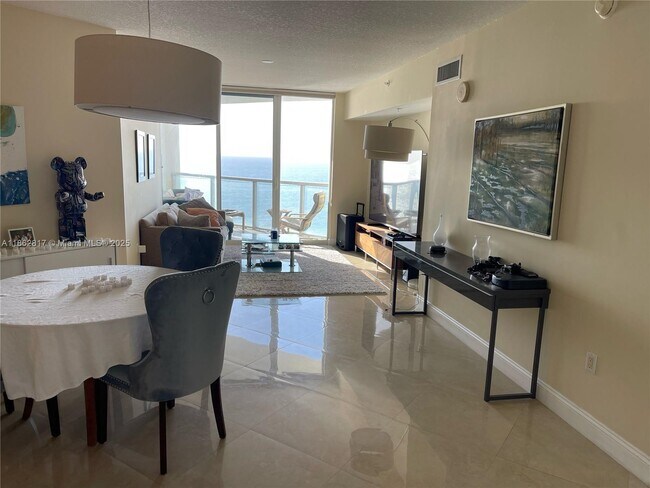 Building Photo - 16699 Collins Ave