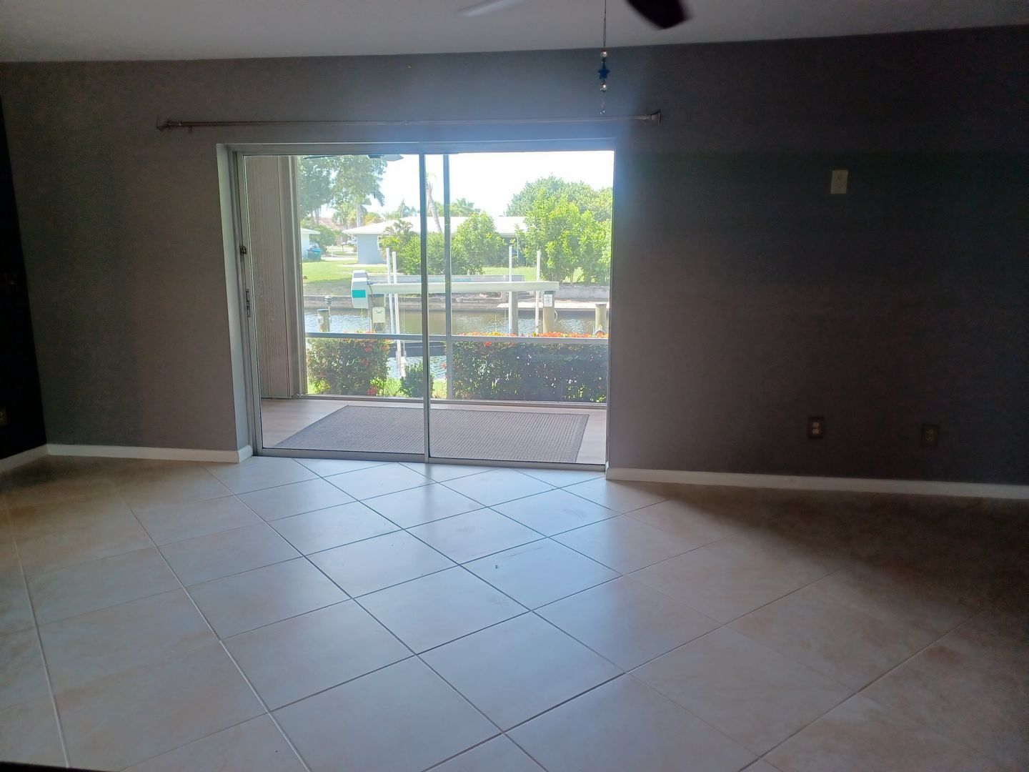 Building Photo - UPGRADED WATERFRONT END UNIT 3 BR / 2 BA Home With BOAT LIFT/ DOCK & OUTSTANDING VIEWS