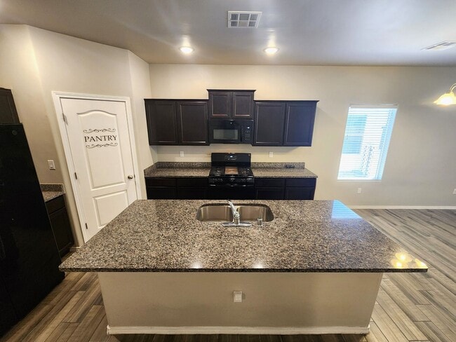 Building Photo - 7039 Chaco St