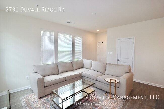 Building Photo - 2 Bedroom Plus DEN End Unit Townhome W Gar...