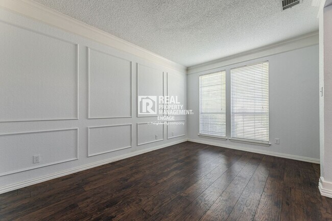 Building Photo - Recently Updated Plano Property with Modern Features and Serene Surroundings