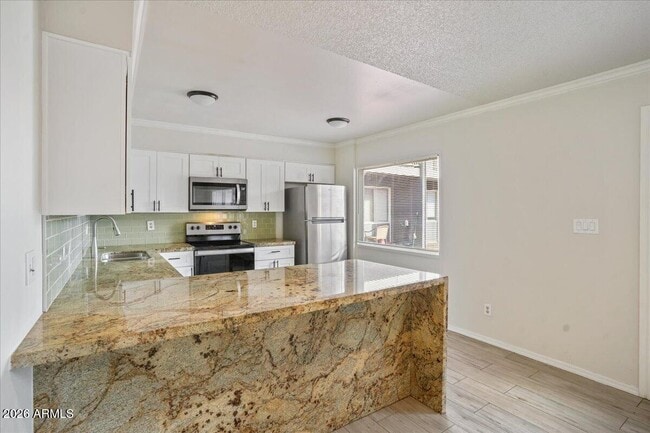 Building Photo - 6528 N 17th Ave