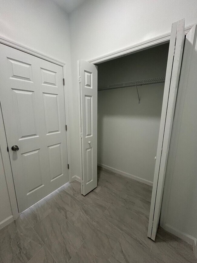 Building Photo - BRAND NEW Modern 4BR/2BA Home with Garage – Peaceful Lake Placid Retreat