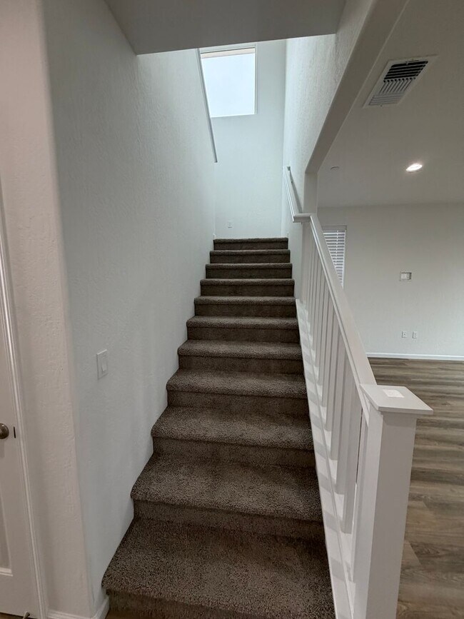 Building Photo - Spacious Brand New 4-Bedroom, 3-Bathroom Home with Solar & Low-Maintenance Yard