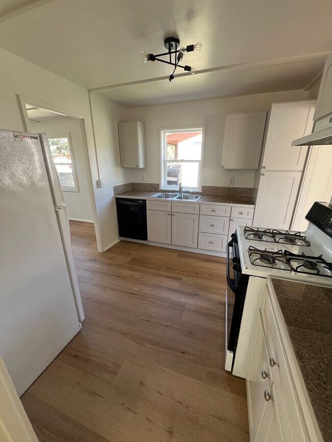 Building Photo - CHARMING! Remodeled 2 Bedroom home with storage and yard