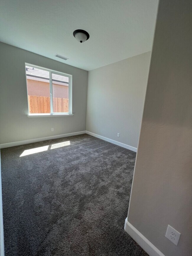 Building Photo - "Modern & Energy-Efficient 3BR/2BA Home wi...