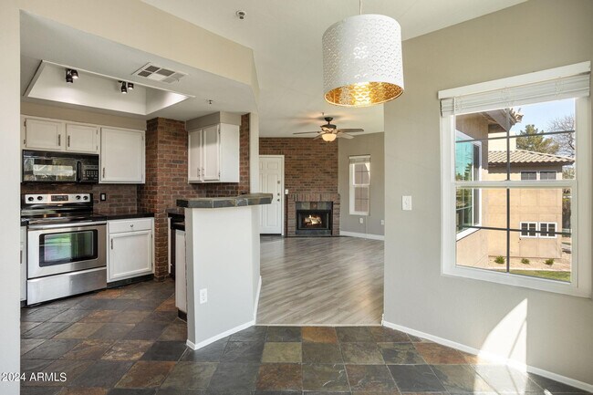 Building Photo - 9451 E Becker Ln