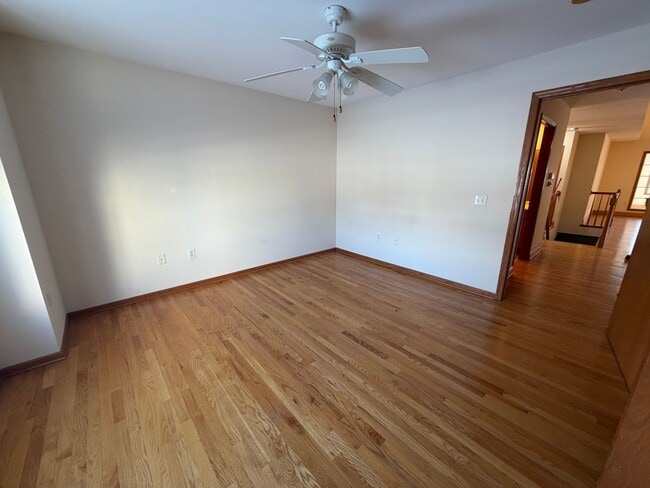 Building Photo - Spacious 3BR/3BA Condo with Finished Basement + 2-Car Garage — Available Now