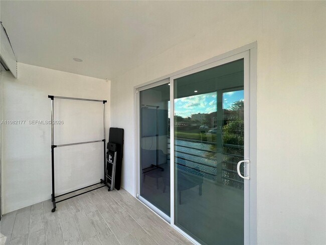 Building Photo - 8595 Sunrise Lakes Blvd