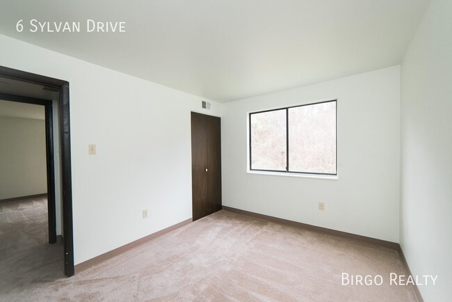 Building Photo - Warm up next to the fire in this 2 bedroom...