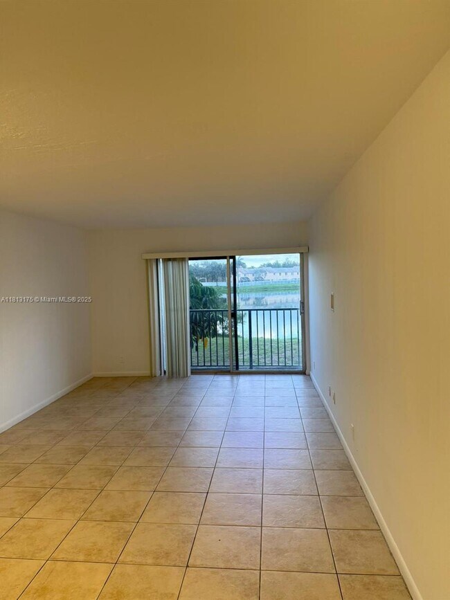 Building Photo - 8560 N Sherman Cir