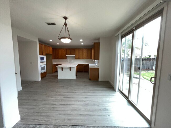 Building Photo - Exceptional 4BR/3BA/3 Car Tandem Garage in Elk Grove | 3140 SF | Tenant Pays $195 monthly for WS&G