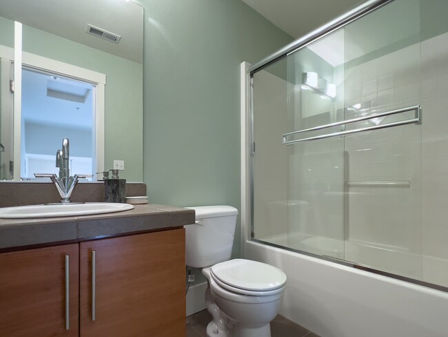 Building Photo - Enjoy this 3 Bedroom 2.5 Bathroom End Townhome ~ 2 Car Garage + Washer & Dryer! Great Cedar Mill ...