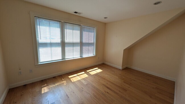 Building Photo - Spacious Townhouse: 4-bed, 3.5 bath unit in Brighton with Garage Parking