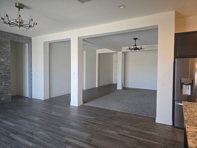 Building Photo - Five-bedroom CASITA home with a three-car ...