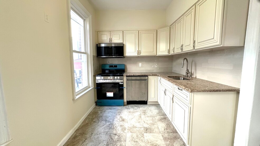 Building Photo - 3869 Bedford Ave