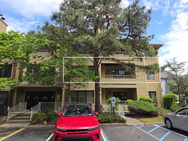 Building Photo - Rare opportunity! Furnished 2nd fl condominium boasting 2 large bedrooms, 2 full bathrooms, forma...