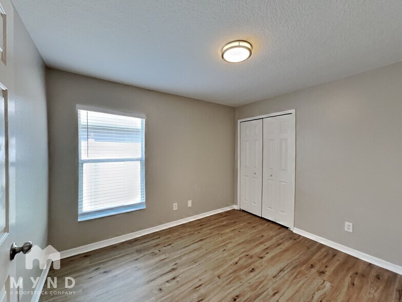 Building Photo - 8721 Persea Ct