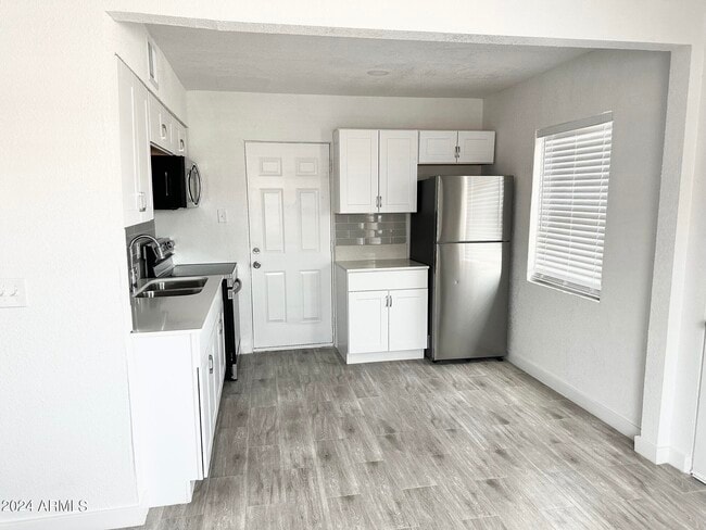 Building Photo - 6808 N 23rd Ave