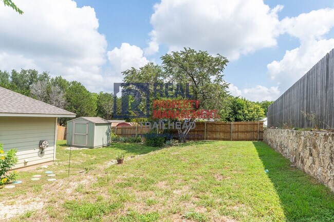 Building Photo - Well-Maintained Home with Large Yard and Storage Shed