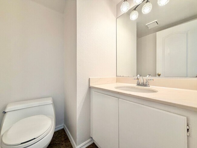 Building Photo - Open-Concept 3 Bedroom 2.5 Bathroom Home with Soaring Ceilings & Spacious Backyard