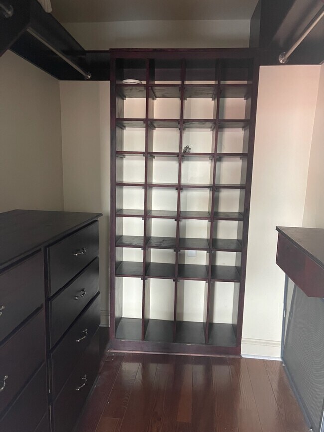 3rd bedroom custom built walk-in closet with shoe rack - 1725 Saint Paul St