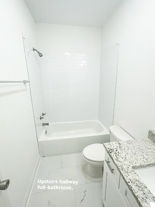 Building Photo - Pet Friendly End Unit Townhome