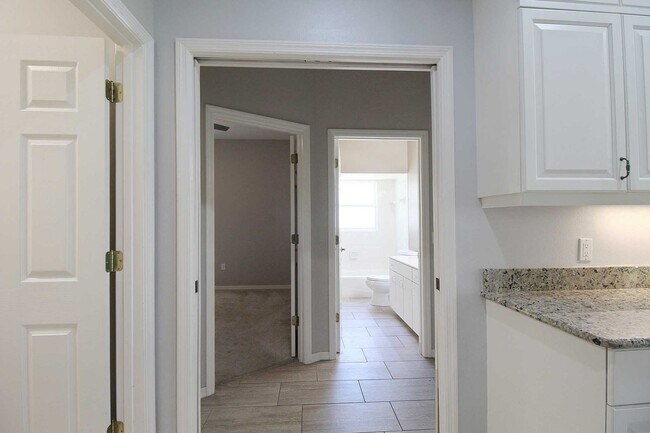 Building Photo - Annual rental: Spacious 3BR/2BA Creekwood Home with Office, Screened Lanai, EV Charger & Resort-S...