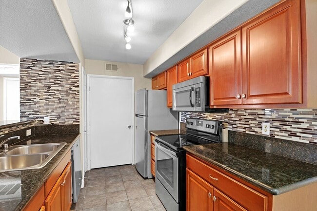Building Photo - SE!!! Gated!! 1 Bedroom 1st Floor!! One Car Garage!!! Community Pool, Spa, Clubhouse!!! All tile ...