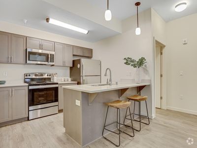 Building Photo - Stunning 1, 2, and 3 Bedroom Apartment Hom...