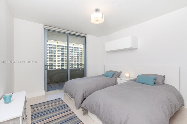 Building Photo - 5555 Collins Ave