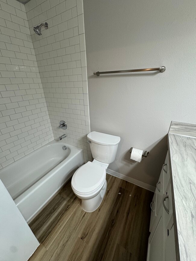 Building Photo - Fully Renovated 2 bedroom, 1.5 bath Apartment with New Appliances and Separate Garage!  Fully Rem...