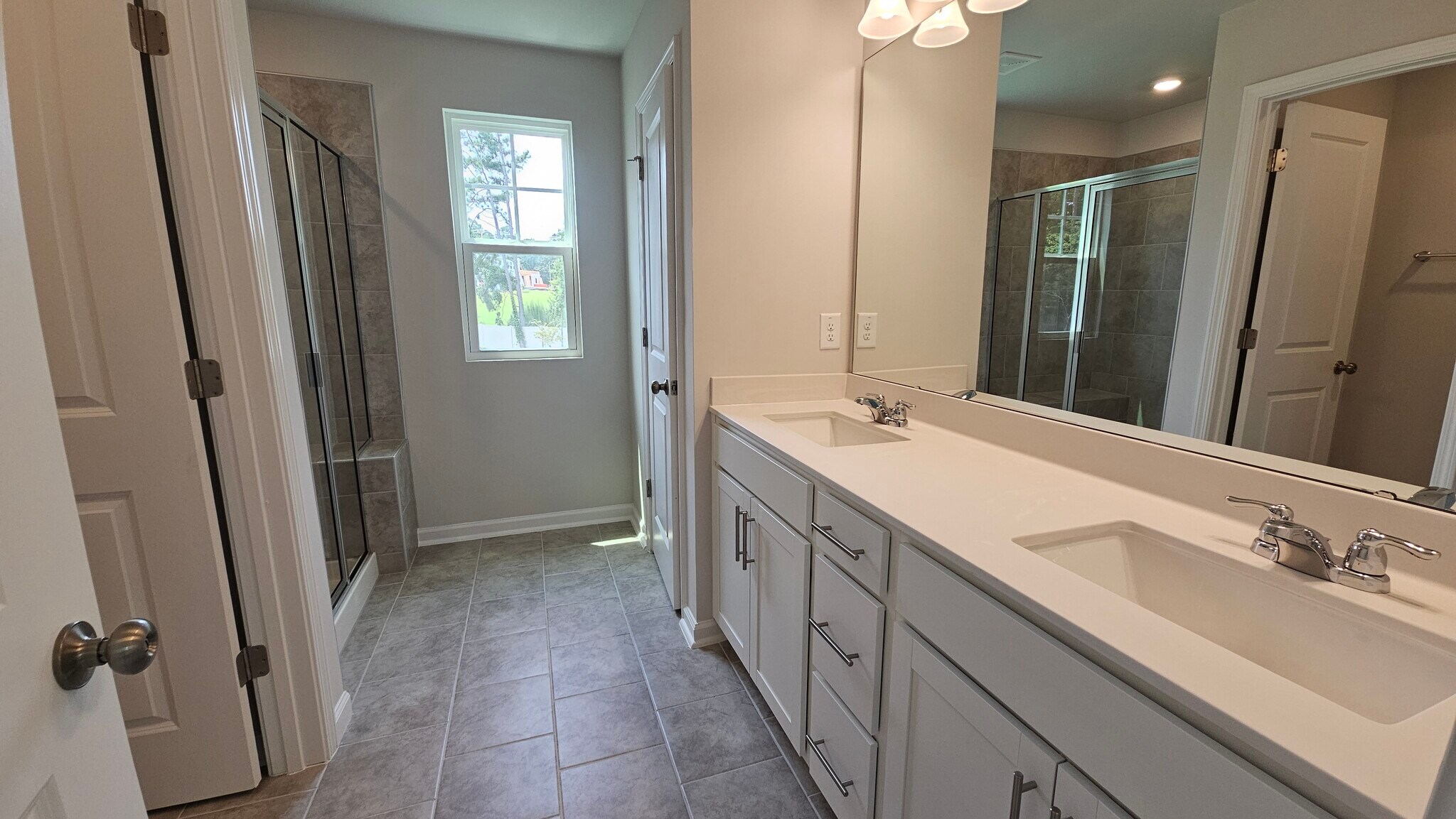 Main Bathroom - double vanities, and a oversized shower to the left - 2207 Cape May Ln